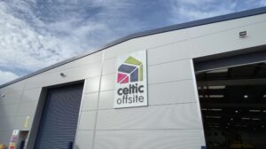 An image of the outside of the Celtic Offsite factory with the logo sign and grey metal wall panels.