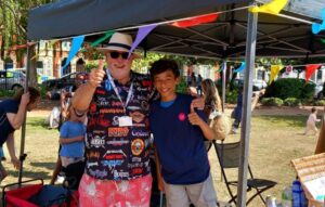 An image of United Welsh's Customer Involvement Coordinator Simon Ireland with his nephew at the Grangetown Pavilion summer festival