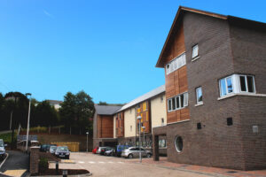 Photo of our Extra Care scheme Llys Nant y Mynydd on a clear, sunny day.