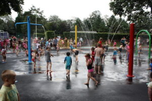 Children playing at the splash pads at Morgan Jones Park.