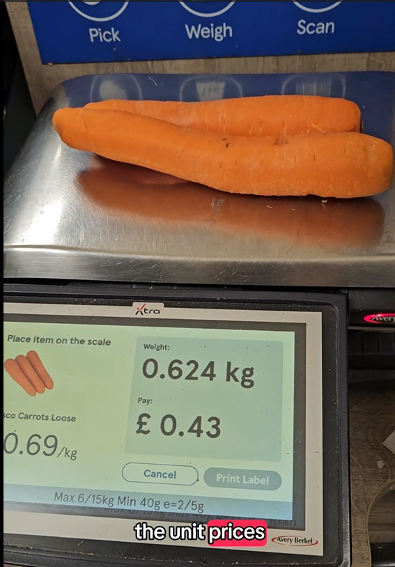 Carrots on supermarket weighing scale. 0.624 Kg of carrots costs 43p